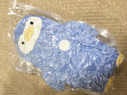 圧縮されたぬいぐるみ